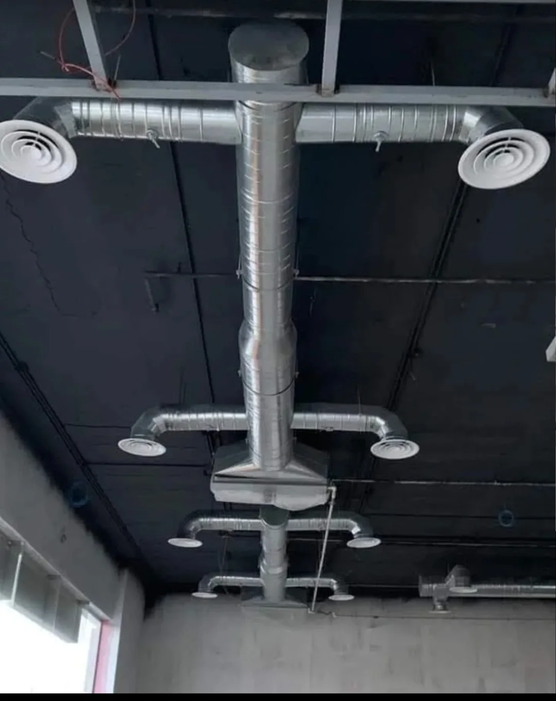 Spiral duct with circular diffusers