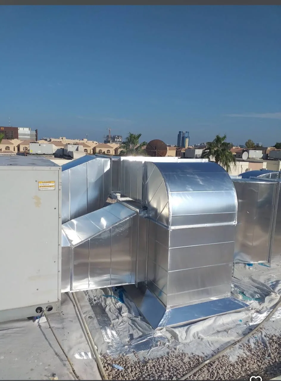 Outdoor galvanized duct connection to AC unit