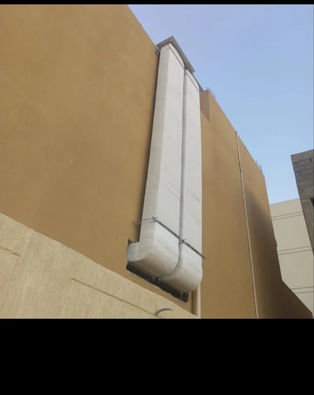 Exterior vertical duct insulation